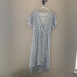 A white dress with blue flowers.